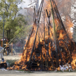 20. Firefighters tend the Sorasaya Shrine tondo bonfire 1