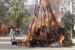20. Firefighters tend the Sorasaya Shrine tondo bonfire 1