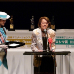 International Judge and woman in "awards" uniform