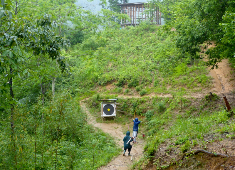 Archery on the Forest Trail in the rain