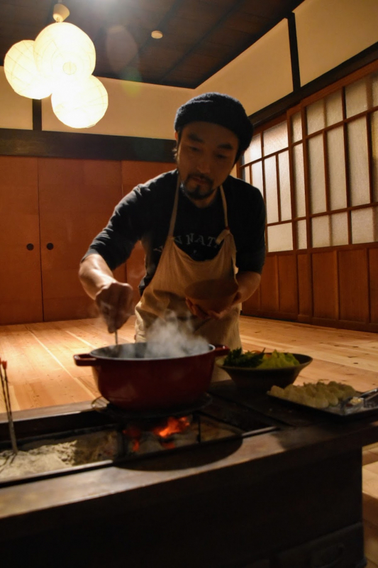 Mr Kurisu cooking up boiled dumplings