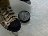 Ice-hockey skates and puck