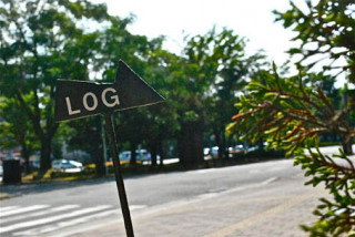 Log sign on street