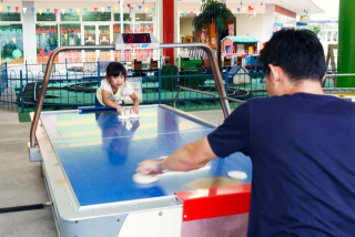 Air hockey- family fun in the arcade