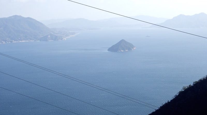 View of a small uninhabited island in the seto inland sea seen from the summit of Mt. Misen on Miyajima in Hiroshima, Japan