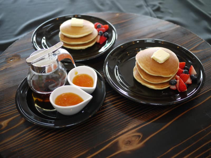 Hotcakes served think and fluffy with fruit or sweet azuki beans