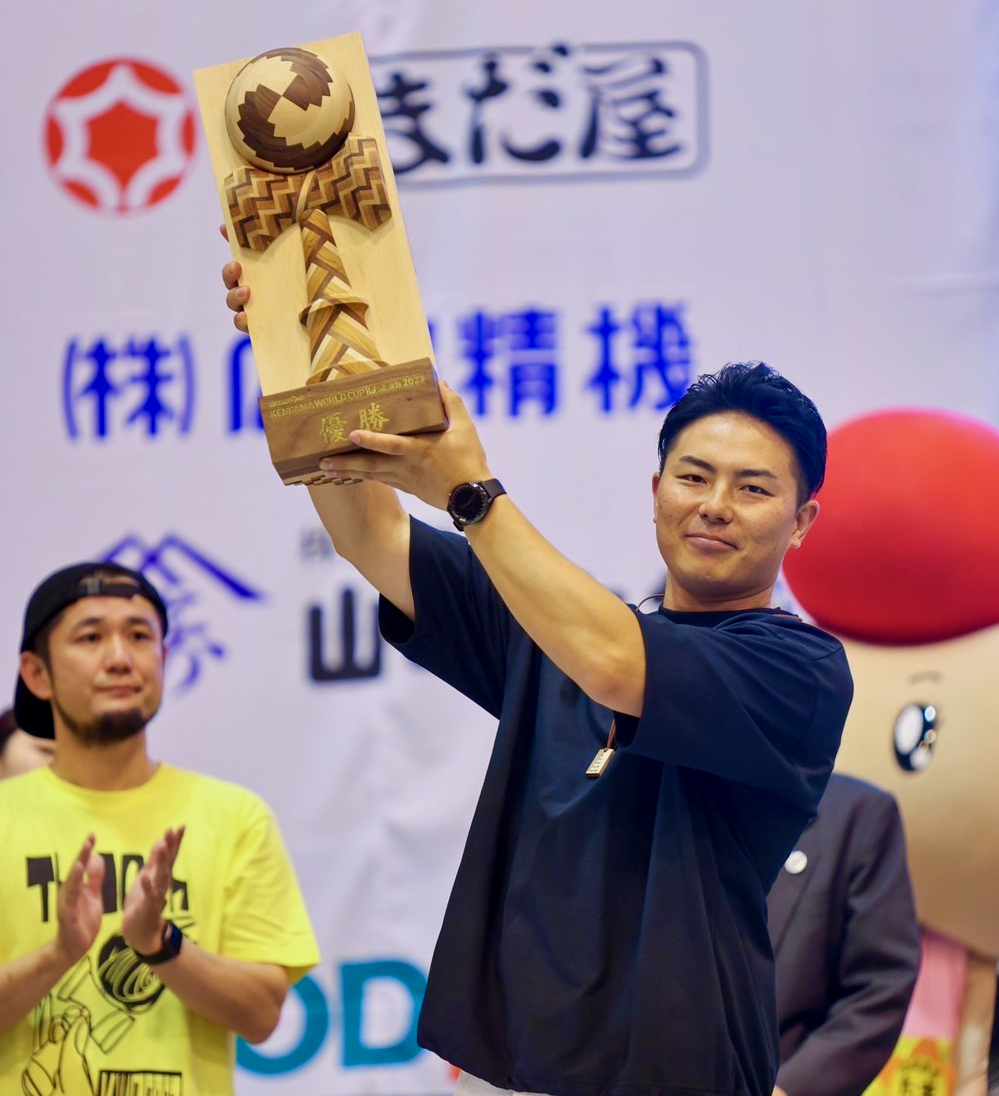 Kazuma Iwata with the 2023 Kendama World Cup trophy